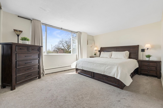 2211 S Highland Ave Unit 1B, Lombard, IL 60148 - bedroom featuring a baseboard heating unit and carpet flooring