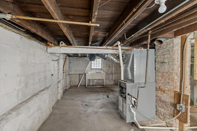 1236 Washington St, Chicago Heights, IL 60411 - below grade area featuring heating unit and a sink