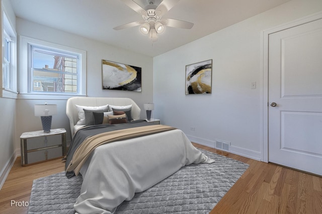 4634 N Hamlin Ave, Chicago, IL 60625 - bedroom featuring light wood-style floors, baseboards, and ceiling fan