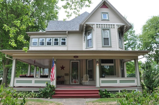 403 E Hickory St, Fairbury, IL 61739 - victorian-style house featuring covered porch and roof with shingles