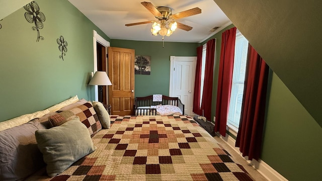 403 E Hickory St, Fairbury, IL 61739 - carpeted bedroom with ceiling fan