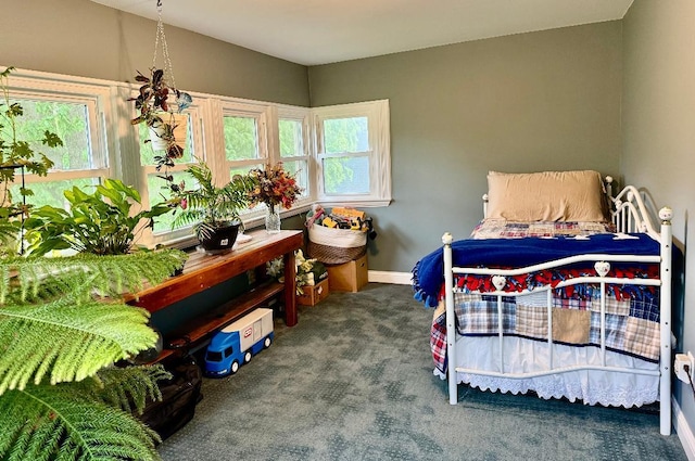 403 E Hickory St, Fairbury, IL 61739 - carpeted bedroom with baseboards