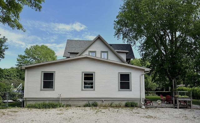 403 E Hickory St, Fairbury, IL 61739 - view of home's exterior featuring a shingled roof