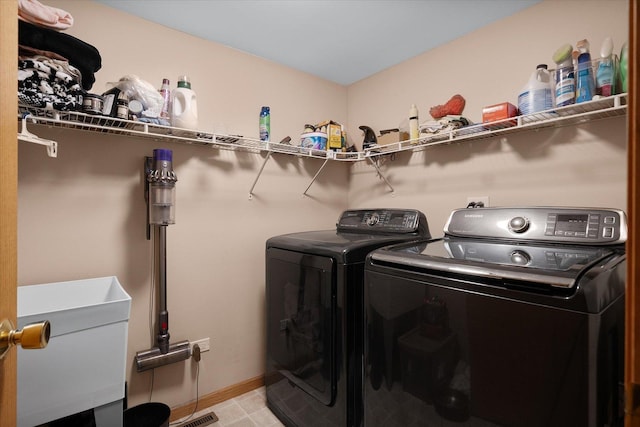 1508 Parkside Dr, Plainfield, IL 60586 - laundry room featuring washer and dryer and baseboards