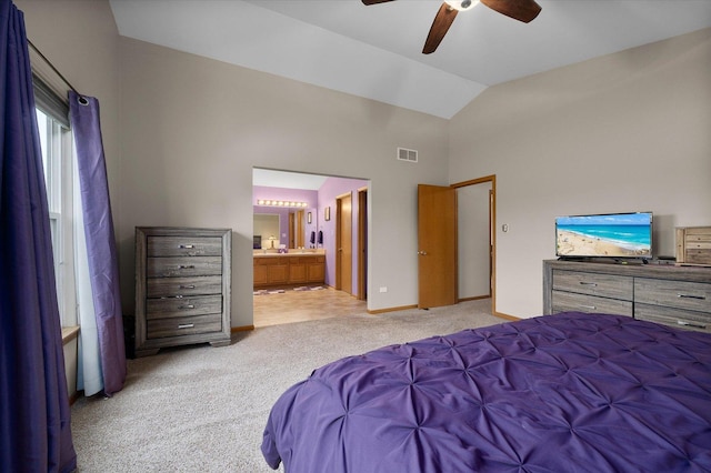 1508 Parkside Dr, Plainfield, IL 60586 - bedroom featuring light carpet, vaulted ceiling, connected bathroom, a ceiling fan, and baseboards