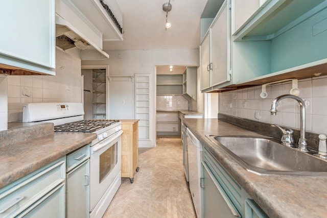 5555 N Sheridan Rd Unit 308, Chicago, IL 60640 - kitchen featuring white appliances, a sink, and tasteful backsplash