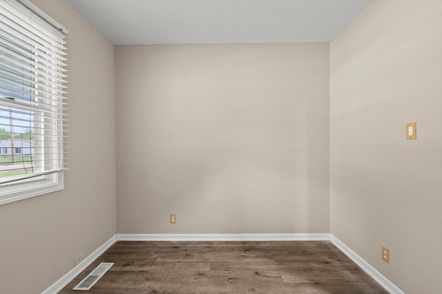 1011 Cypress Ln, Joliet, IL 60435 - spare room featuring wood finished floors and baseboards