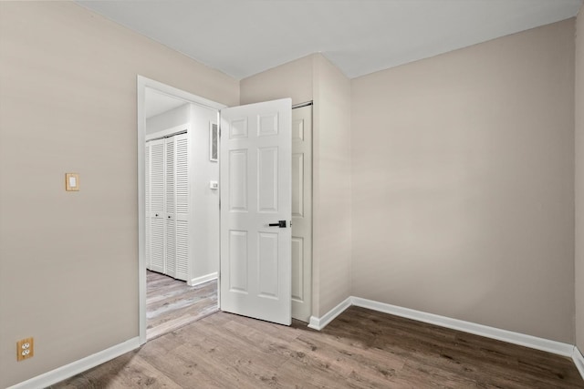1011 Cypress Ln, Joliet, IL 60435 - empty room featuring wood finished floors and baseboards