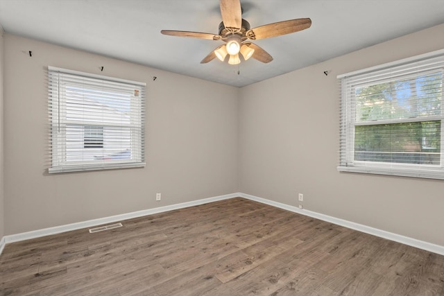 1011 Cypress Ln, Joliet, IL 60435 - empty room featuring wood finished floors and a ceiling fan