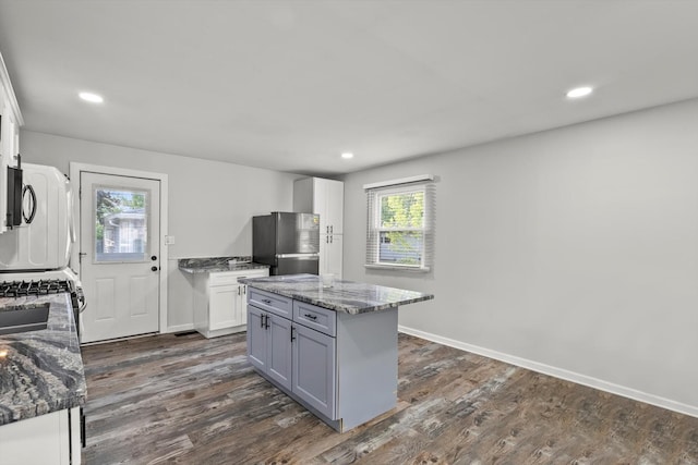 1011 Cypress Ln, Joliet, IL 60435 - kitchen with freestanding refrigerator, dark wood-style flooring, stone counters, white cabinets, and recessed lighting