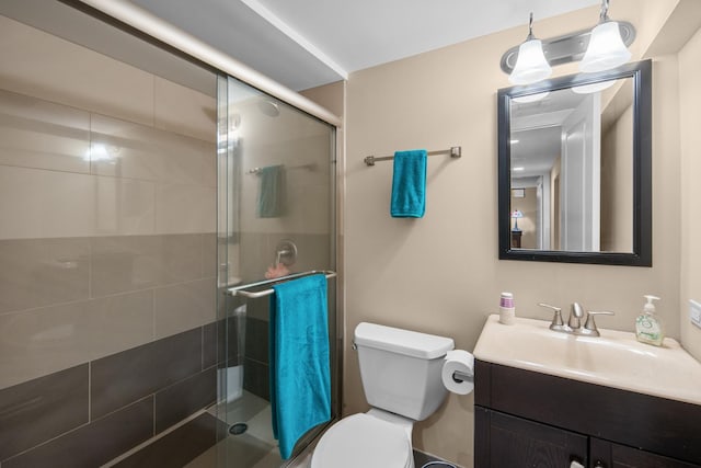 1000 Meadow Rd, Northbrook, IL 60062 - bathroom featuring vanity, toilet, and a stall shower