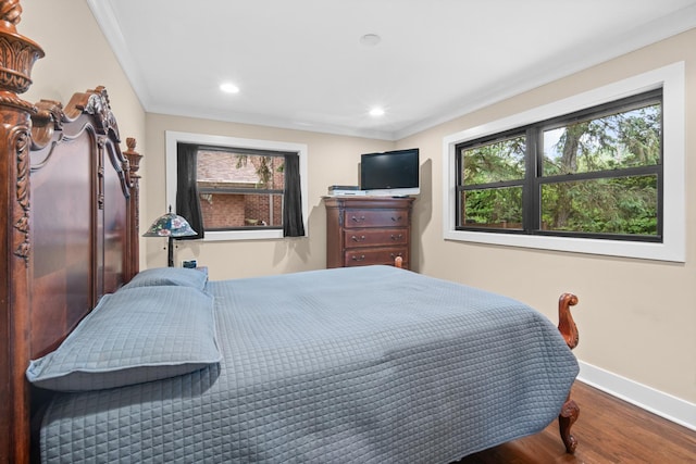 1000 Meadow Rd, Northbrook, IL 60062 - bedroom featuring wood finished floors, baseboards, recessed lighting, and ornamental molding
