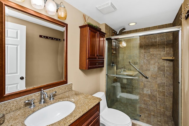 2165 Sunderland Ct Unit 101A, Naperville, IL 60565 - bathroom with vanity, toilet, a stall shower, and recessed lighting