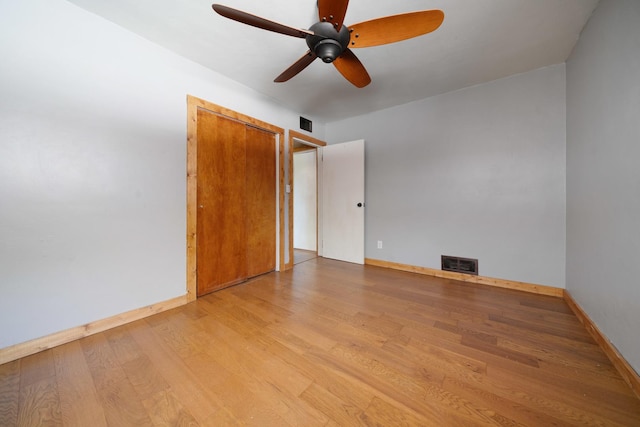 522 Division St, Pecatonica, IL 61063 - unfurnished room featuring wood finished floors, ceiling fan, and baseboards