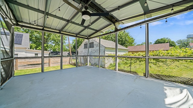 522 Division St, Pecatonica, IL 61063 - unfurnished sunroom with ceiling fan