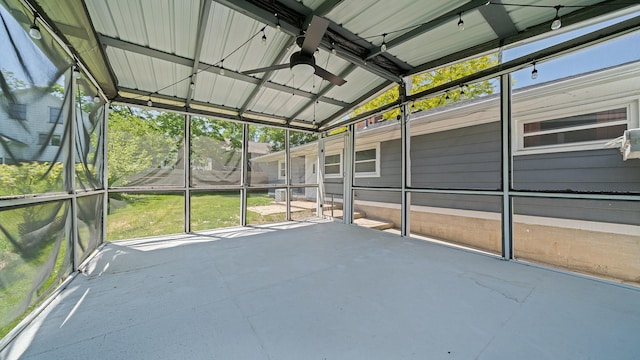 522 Division St, Pecatonica, IL 61063 - unfurnished sunroom featuring a ceiling fan and vaulted ceiling