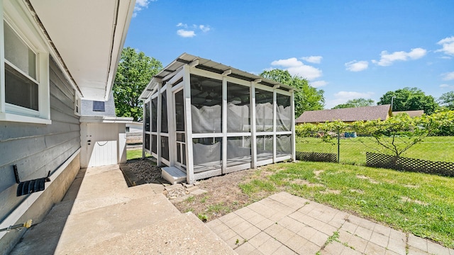 522 Division St, Pecatonica, IL 61063 - view of outbuilding featuring a sunroom