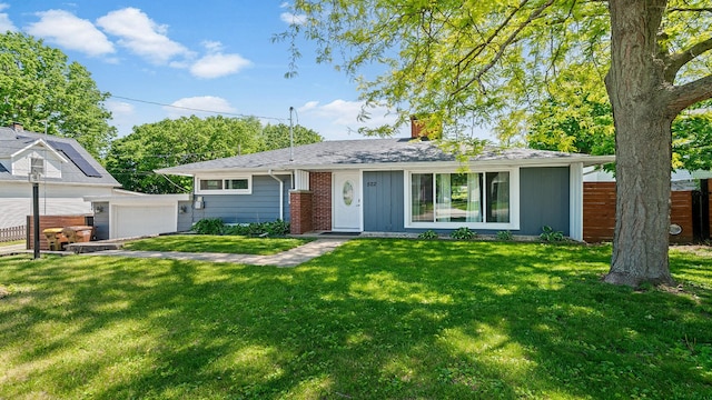 522 Division St, Pecatonica, IL 61063 - view of front of property featuring a chimney and a detached garage