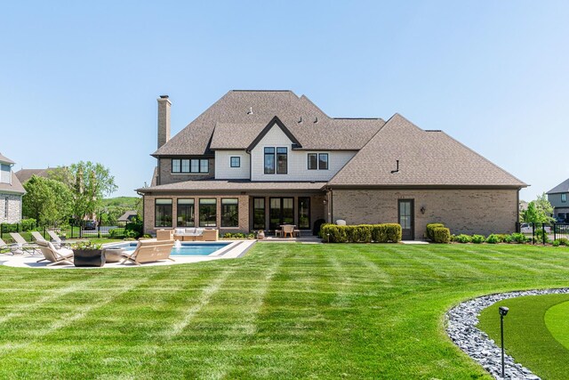 5N257 Switchgrass Ln, Saint Charles, IL 60175 - view of front of house featuring a residential view, a chimney, roof with shingles, brick siding, and a front yard