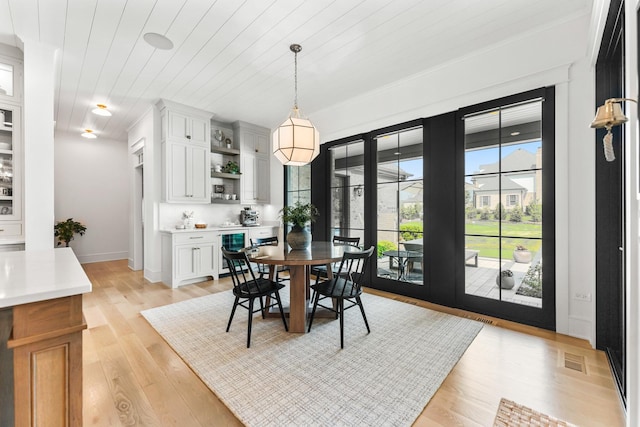 5N257 Switchgrass Ln, Saint Charles, IL 60175 - dining room with wine cooler, light wood finished floors, and wooden ceiling