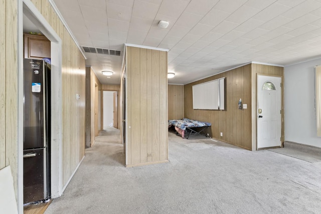 8 Sparrow Rd, Carpentersville, IL 60110 - corridor featuring carpet, crown molding, wooden walls, and baseboards