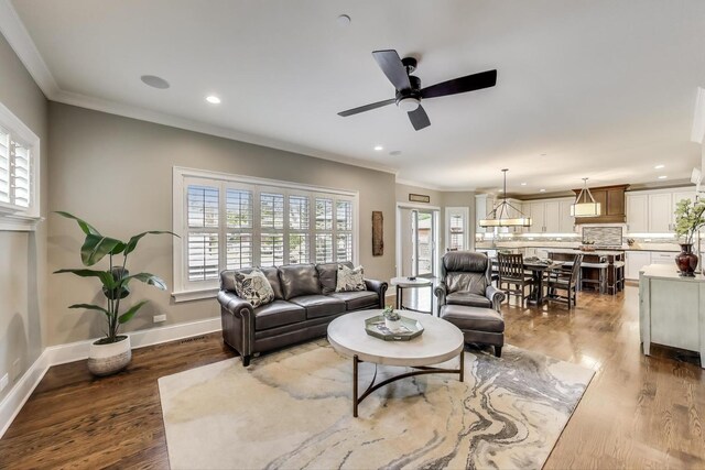 212 S Wa Pella Ave, Mount Prospect, IL 60056 - living room with healthy amount of natural light, recessed lighting, a ceiling fan, baseboards, and wood finished floors