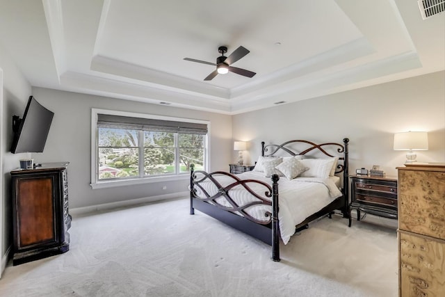212 S Wa Pella Ave, Mount Prospect, IL 60056 - bedroom with a tray ceiling, light colored carpet, ceiling fan, and baseboards