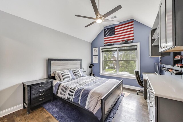212 S Wa Pella Ave, Mount Prospect, IL 60056 - bedroom with dark wood-style floors, lofted ceiling, baseboards, a desk, and a ceiling fan