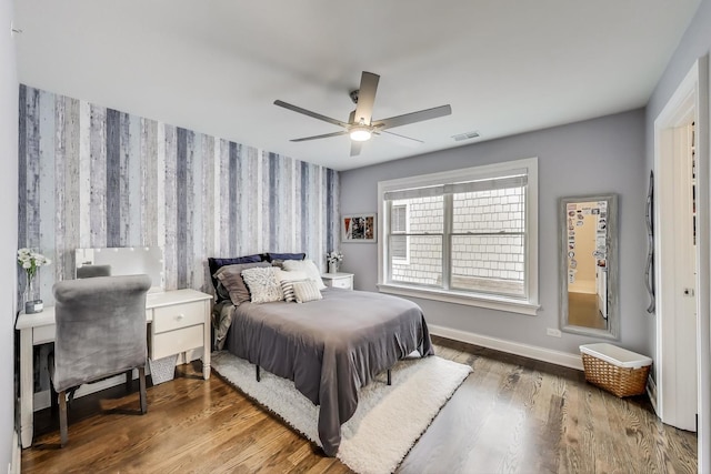 212 S Wa Pella Ave, Mount Prospect, IL 60056 - bedroom featuring wallpapered walls, baseboards, wood finished floors, and a ceiling fan