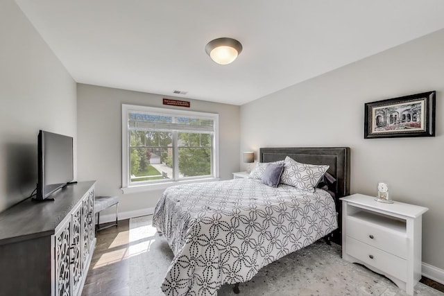212 S Wa Pella Ave, Mount Prospect, IL 60056 - bedroom featuring baseboards and wood finished floors