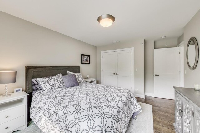 212 S Wa Pella Ave, Mount Prospect, IL 60056 - bedroom featuring wood finished floors, a closet, and baseboards