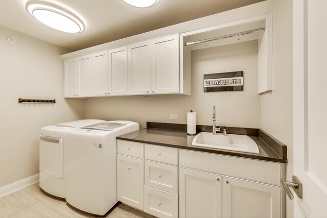 212 S Wa Pella Ave, Mount Prospect, IL 60056 - washroom with washing machine and clothes dryer, cabinet space, baseboards, and light tile patterned floors