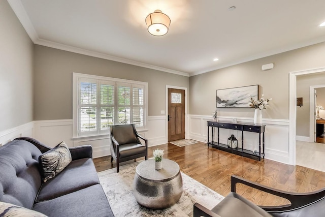 212 S Wa Pella Ave, Mount Prospect, IL 60056 - living area featuring wood finished floors, a wainscoted wall, ornamental molding, and recessed lighting