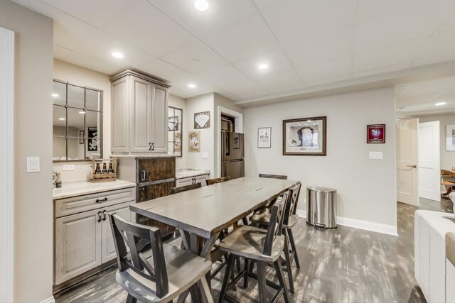 212 S Wa Pella Ave, Mount Prospect, IL 60056 - dining room with dark wood-style floors, baseboards, a paneled ceiling, and recessed lighting