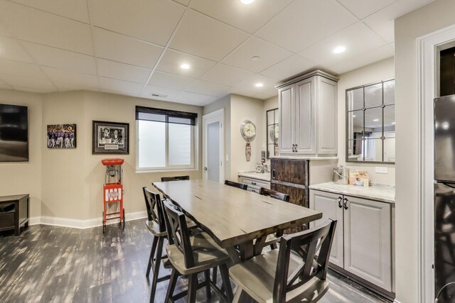212 S Wa Pella Ave, Mount Prospect, IL 60056 - dining space with baseboards, a paneled ceiling, dark wood finished floors, and recessed lighting