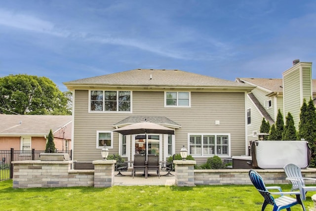212 S Wa Pella Ave, Mount Prospect, IL 60056 - rear view of property featuring a patio area and a hot tub