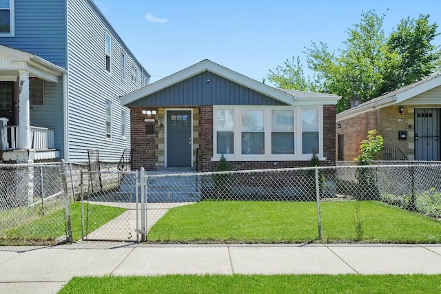 1467 W 73rd St, Chicago, IL 60636 - view of front of home featuring a gate and brick siding
