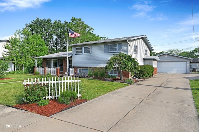 9446 Magnolia Ave, Mokena, IL 60448 - tri-level home with brick siding, an outdoor structure, a front lawn, and a detached garage