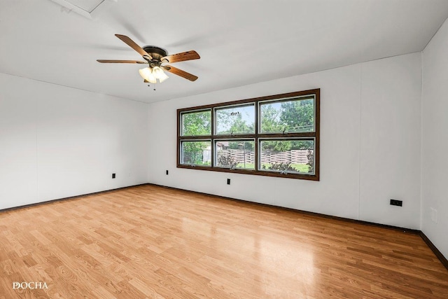 9446 Magnolia Ave, Mokena, IL 60448 - unfurnished room with wood finished floors and ceiling fan