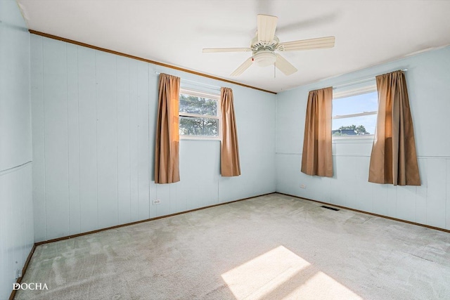 9446 Magnolia Ave, Mokena, IL 60448 - carpeted empty room with a ceiling fan and crown molding