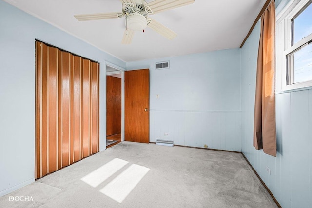 9446 Magnolia Ave, Mokena, IL 60448 - unfurnished bedroom featuring carpet floors, a closet, and a ceiling fan