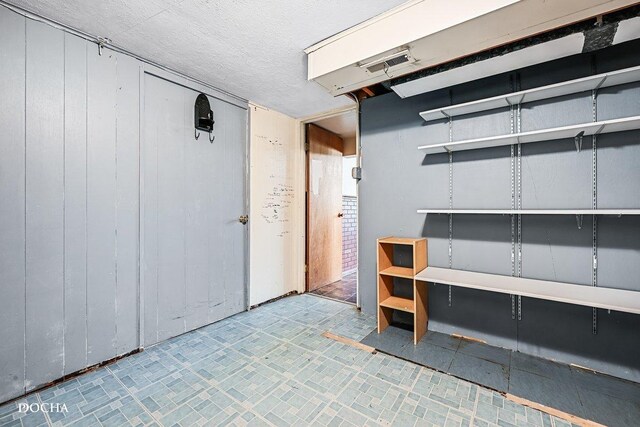 9446 Magnolia Ave, Mokena, IL 60448 - below grade area featuring a textured ceiling