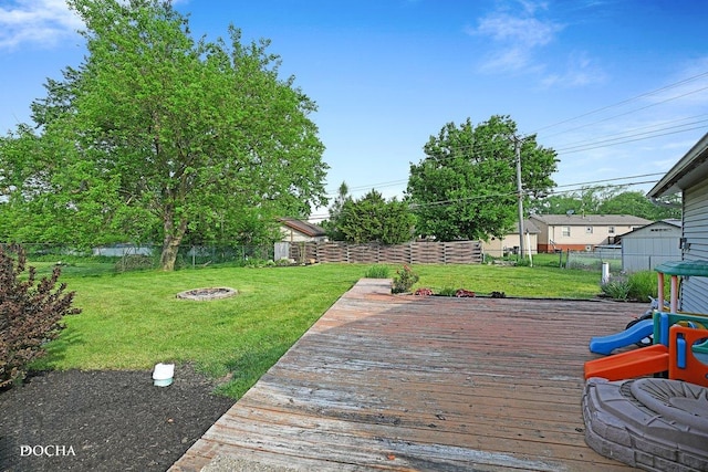 9446 Magnolia Ave, Mokena, IL 60448 - wooden terrace featuring an outdoor fire pit and a fenced backyard