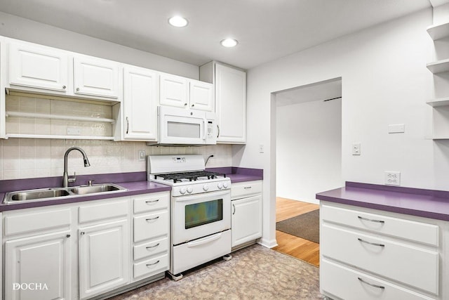 9446 Magnolia Ave, Mokena, IL 60448 - kitchen with white appliances, open shelves, white cabinets, decorative backsplash, and dark countertops