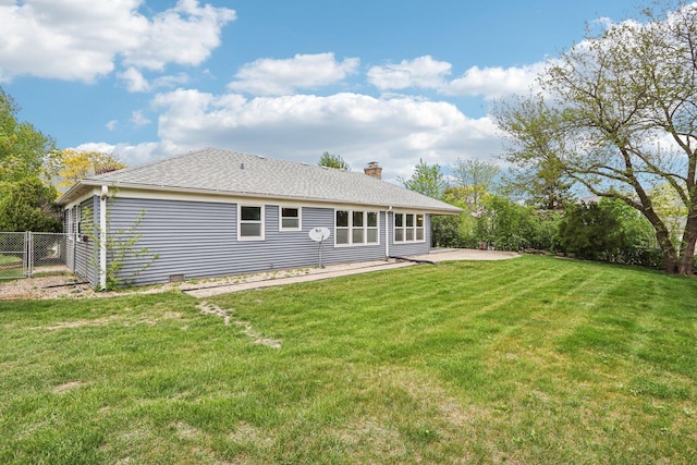 1139 W Illinois Ave, Palatine, IL 60067 - back of property featuring a patio area, a chimney, and a shingled roof