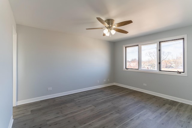 6154 W 63rd St Unit 3W, Chicago, IL 60638 - unfurnished room with dark wood finished floors, a ceiling fan, and baseboards
