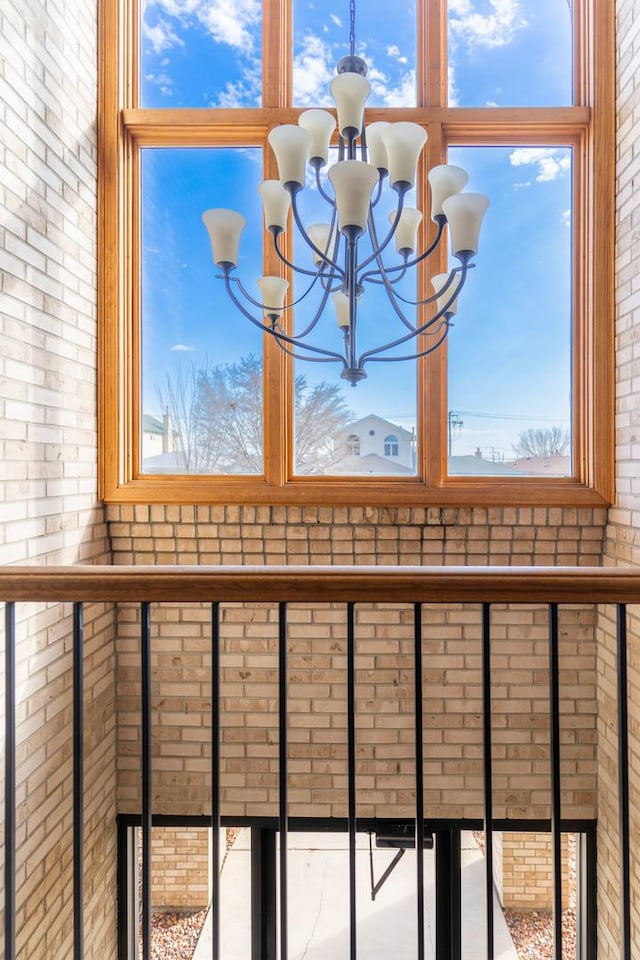 6154 W 63rd St Unit 3W, Chicago, IL 60638 - detailed view of brick wall and a chandelier