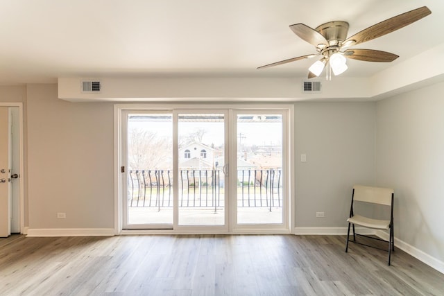6154 W 63rd St Unit 3W, Chicago, IL 60638 - entryway with light wood-style floors, baseboards, and ceiling fan