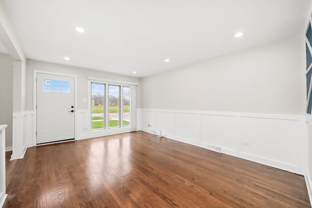 10244 S Crandon Ave, Chicago, IL 60617 - entryway with a wainscoted wall, a decorative wall, wood finished floors, and recessed lighting