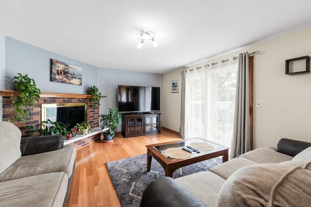 1018 Brighton Ct, Schaumburg, IL 60193 - living area with light wood finished floors and a fireplace